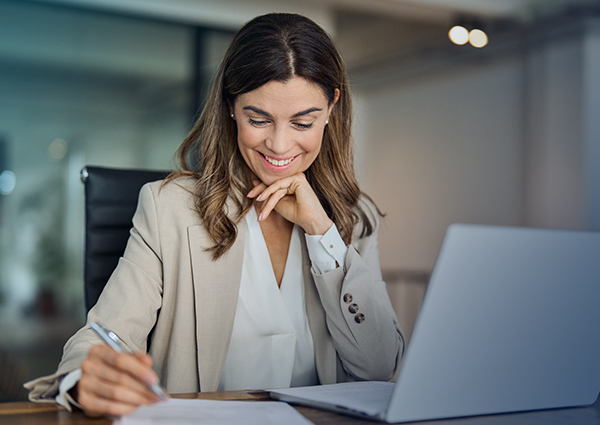 Woman professional attending an AHIMA webinar