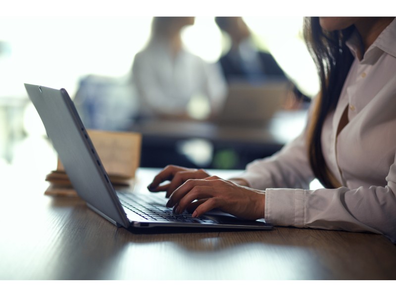 Entering information on laptop